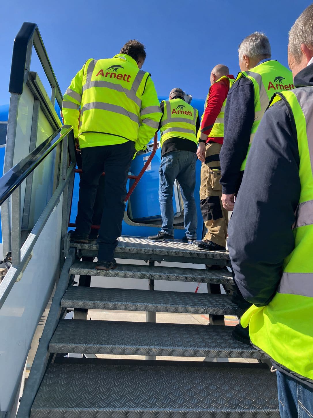 Arnett UK operatives accessing an aircraft airside